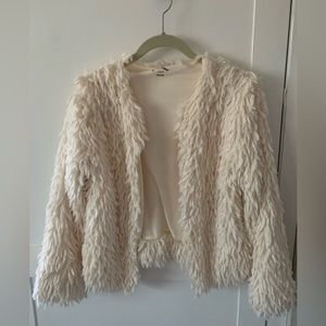This little furry jacket is so stylish and fun!